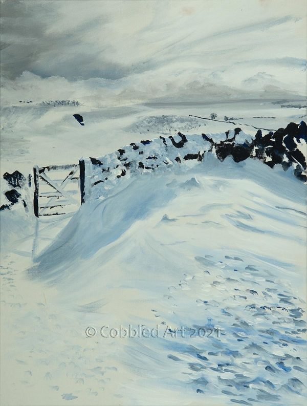 a gate in a wall on a snow covered moorland